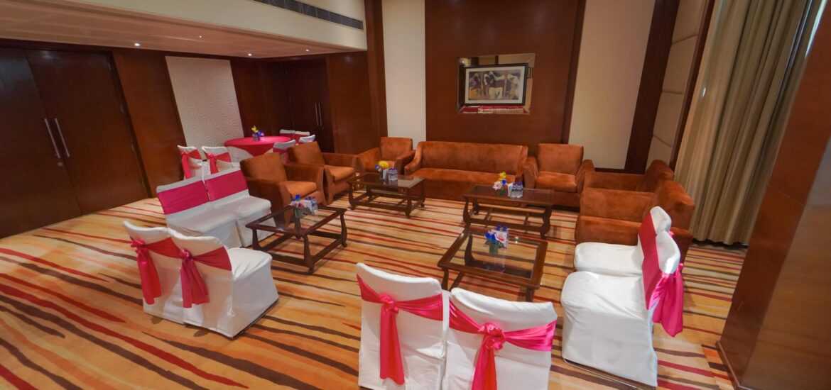 Sofas and chairs arranged in the conference room