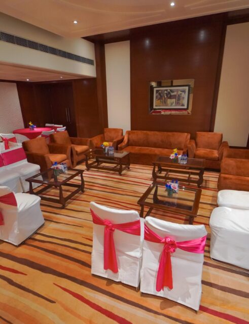 Sofas and chairs arranged in the conference room